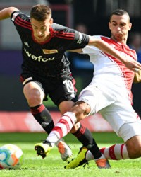  网坛常青树展韧性，费雷尔长盘鏖战告捷